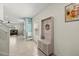 Entryway with built-in storage and decor, leading to a living room area at 3270 Rock Sound St, Bradenton, FL 34208