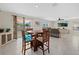 Bright living room features tile floors and sliding glass doors to the backyard at 3270 Rock Sound St, Bradenton, FL 34208