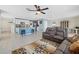 Open-concept layout with a modern kitchen featuring a breakfast bar and seating at 3270 Rock Sound St, Bradenton, FL 34208