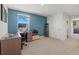 Comfortable office space features a large window for natural light and a calming teal accent wall at 3270 Rock Sound St, Bradenton, FL 34208