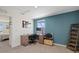 Comfortable office space features a large window for natural light and a calming teal accent wall at 3270 Rock Sound St, Bradenton, FL 34208