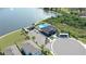 Aerial view of a community pool, clubhouse, and lakeside recreational area at 3270 Rock Sound St, Bradenton, FL 34208