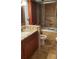 Nicely remodeled bathroom features tiled shower and granite countertop at 632 Edgewater Dr # 832, Dunedin, FL 34698