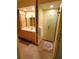 Bathroom showcasing a sink vanity and frosted glass enclosed shower at 632 Edgewater Dr # 832, Dunedin, FL 34698