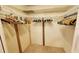 Walk-in closet with custom organizers providing optimal storage and accessibility at 632 Edgewater Dr # 832, Dunedin, FL 34698