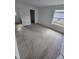 This bedroom has natural light from the windows and a convenient doorway at 1544 Blue Bayou Cir, Ruskin, FL 33570