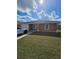 Charming single-story home with a well-maintained lawn and attached garage at 1544 Blue Bayou Cir, Ruskin, FL 33570