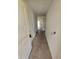 Hallway leading into a home with uninstalled electrical work at 1544 Blue Bayou Cir, Ruskin, FL 33570