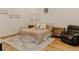 Bedroom featuring neutral colors and natural wood furniture at 18142 Powerline Rd, Dade City, FL 33523