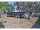 Backyard view of enclosed patio area at 6443 34Th N Ave, St Petersburg, FL 33710