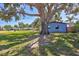 Large backyard with mature trees providing ample shade to the yard at 6443 34Th N Ave, St Petersburg, FL 33710