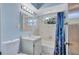 Cozy bathroom with a shower-tub combo and blue accents at 6443 34Th N Ave, St Petersburg, FL 33710