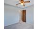 Bedroom featuring a ceiling fan and a door to another area at 6443 34Th N Ave, St Petersburg, FL 33710