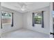 Bright bedroom with modern flooring, two windows, and ample natural light at 6443 34Th N Ave, St Petersburg, FL 33710