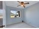 Bedroom featuring a ceiling fan and a window for natural light at 6443 34Th N Ave, St Petersburg, FL 33710