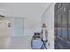 Inviting entryway with modern gray door and light gray walls at 6443 34Th N Ave, St Petersburg, FL 33710