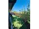 Cozy backyard with artificial turf, a wooden fence and landscaping, ideal for relaxation and entertaining at 15515 Morning Dr, Lutz, FL 33559