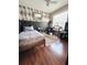 This bedroom features modern wallpaper and a desk/study space at 15515 Morning Dr, Lutz, FL 33559