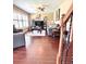Bright living room with plantation shutters and tile flooring at 15515 Morning Dr, Lutz, FL 33559