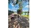 Charming picnic area overlooking the lake, perfect for outdoor relaxation and enjoying scenic views at 15515 Morning Dr, Lutz, FL 33559