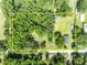 Aerial view of property with defined boundaries and lush green trees providing privacy and a tranquil setting at 13091 Old Crystal River Rd, Brooksville, FL 34601