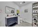Stylish bathroom with a modern vanity, decorative mirror, and industrial-style shelving at 13091 Old Crystal River Rd, Brooksville, FL 34601