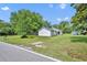Lovely home featuring a spacious yard, mature trees, and a peaceful atmosphere at 13091 Old Crystal River Rd, Brooksville, FL 34601