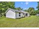 Charming home featuring new landscaping, a stucco exterior, and a lush green lawn at 13091 Old Crystal River Rd, Brooksville, FL 34601