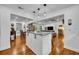 Spacious kitchen island with granite countertops provides ample seating and overlooks the open-concept living area at 13091 Old Crystal River Rd, Brooksville, FL 34601