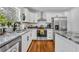 Well-equipped kitchen with stainless steel appliances, granite countertops, and ample cabinet space at 13091 Old Crystal River Rd, Brooksville, FL 34601