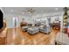 Open floor plan with a spacious living area, dining space, and a view of the kitchen at 13091 Old Crystal River Rd, Brooksville, FL 34601