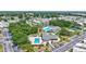 Aerial view of the community, highlighting pools and amenities at 9790 66Th N St # 89, Pinellas Park, FL 33782