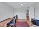 Spacious bedroom with a desk, ceiling fan, and wood-look flooring at 9790 66Th N St # 89, Pinellas Park, FL 33782
