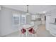 Dining area featuring a table with seating for four and natural light at 9790 66Th N St # 89, Pinellas Park, FL 33782