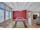 Dining room features lots of natural light, tray ceilings, laminate wood flooring and accent wall at 9790 66Th N St # 89, Pinellas Park, FL 33782