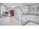 Bright kitchen featuring white cabinetry, ample countertop space, and stainless steel appliances at 9790 66Th N St # 89, Pinellas Park, FL 33782