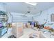 Spacious garage filled with boxes and storage, ready for organization at 107 Dakota Hill Dr, Seffner, FL 33584