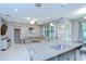 Bright open-concept living space featuring a comfortable sofa, stylish decor, and ample natural light at 107 Dakota Hill Dr, Seffner, FL 33584