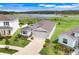 Inviting home with a neat yard, situated in a lovely neighborhood close to a picturesque lake at 13797 Wineberry Dr, Dade City, FL 33525