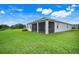 Expansive backyard with screened in porch at 13797 Wineberry Dr, Dade City, FL 33525