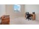Spare bedroom set up as office with natural light at 13797 Wineberry Dr, Dade City, FL 33525