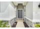 Close up shows the front door with stone facade at 13797 Wineberry Dr, Dade City, FL 33525