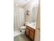 Functional bathroom with a shower and tub combination and modern sink, creating a convenient space at 26620 Shoregrass Dr, Wesley Chapel, FL 33544