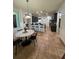A spacious kitchen includes granite countertops, a breakfast bar with seating, and a charming breakfast nook at 26620 Shoregrass Dr, Wesley Chapel, FL 33544