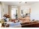 A full view of the living room showcasing the furniture, flooring and patio view at 26620 Shoregrass Dr, Wesley Chapel, FL 33544