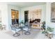 Outdoor patio area featuring dining table, chairs, and sliding glass doors to indoor living area at 26620 Shoregrass Dr, Wesley Chapel, FL 33544