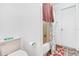 Toilet and shower are displayed in this basic bathroom at 3401 Sunrise Villas S Ct, Tampa, FL 33614