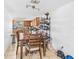 The dining area shows the transition to kitchen, creating an inviting space at 3401 Sunrise Villas S Ct, Tampa, FL 33614