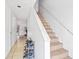 Bright entryway with tiled floors, carpeted stairs, and ample storage space for shoes at 3401 Sunrise Villas S Ct, Tampa, FL 33614
