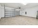 Spacious garage with an automatic door and epoxy floor at 2139 Stellar Brilliance Way, Lutz, FL 33558